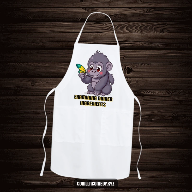 Funny kawaii gorilla with wide eyes observing a butterfly on an apron, blending kitchen practicality with a touch of curious charm.