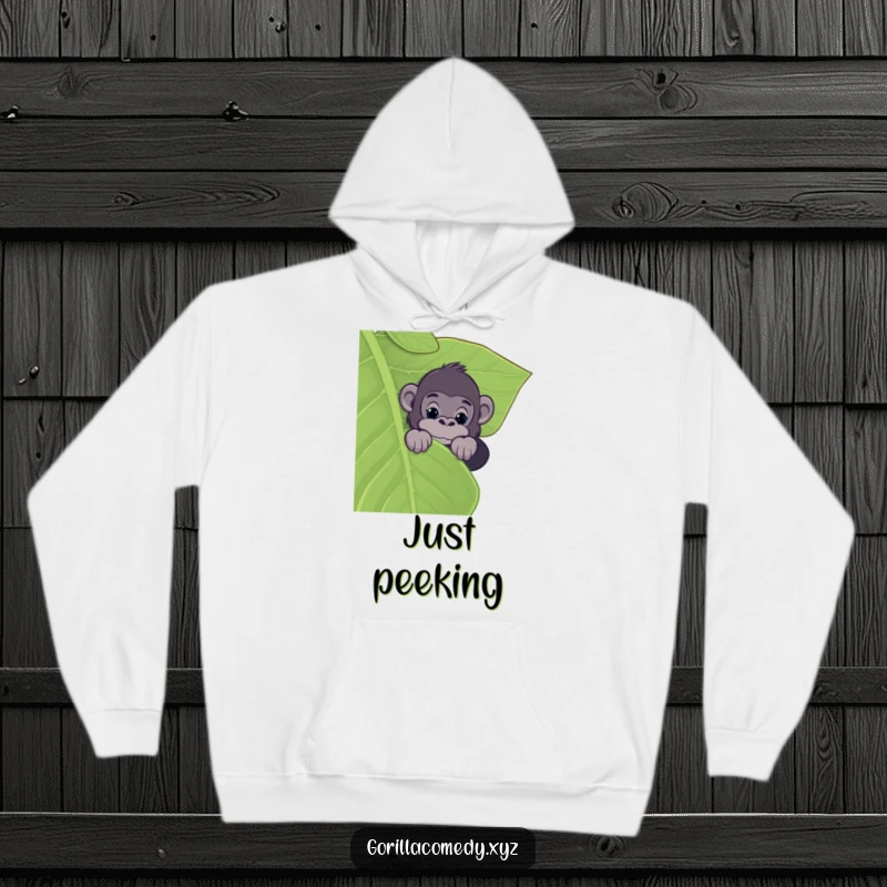 Funny hoodie with a gorilla peeking over a large leaf, offering a cozy and intriguing jungle-themed design for wearers.