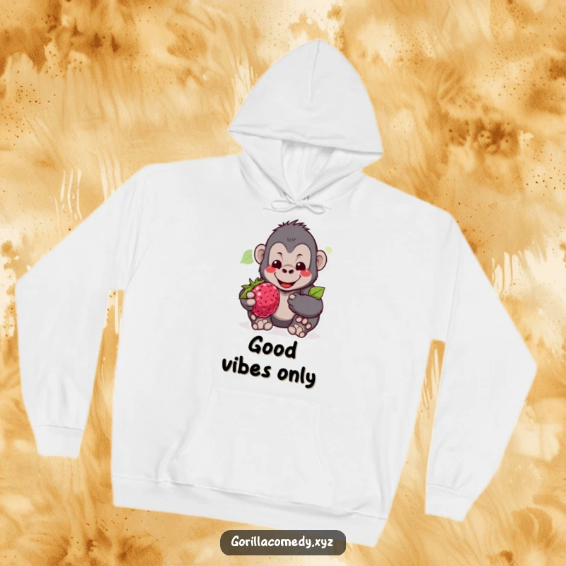 Funny hoodie featuring a gentle gorilla character smiling warmly while offering a juicy berry, embodying cozy kindness.