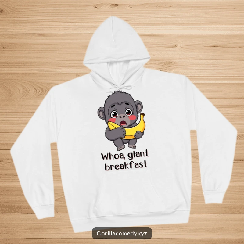 Funny gorilla hoodie, surprised character with wide eyes, holding an oversized banana, cozy and comical design.