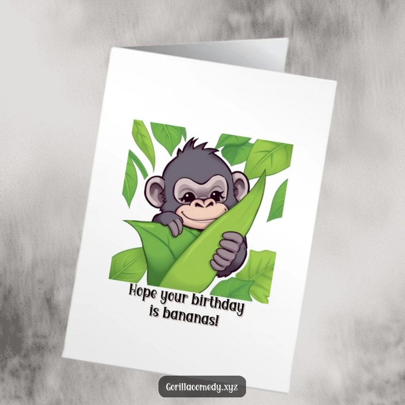 Funny Free Printable Gorilla Birthday Card: A mischievous gorilla peeks from behind a leaf with a playful wink, ready for fun.