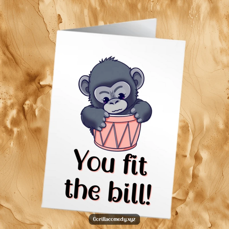 Funny free printable congratulations card: curious gorilla trying to squeeze into a tiny drum, looking stuck.