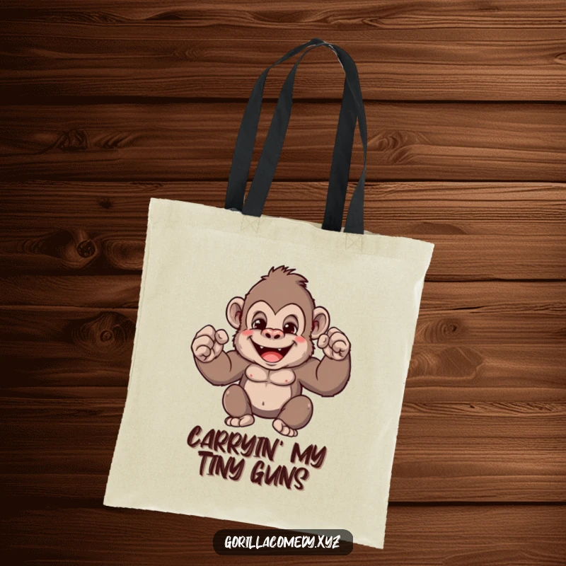 Funny gorilla tote bag featuring a cute character flexing small biceps with a smile, ideal for carrying groceries or gym gear with humorous flair.